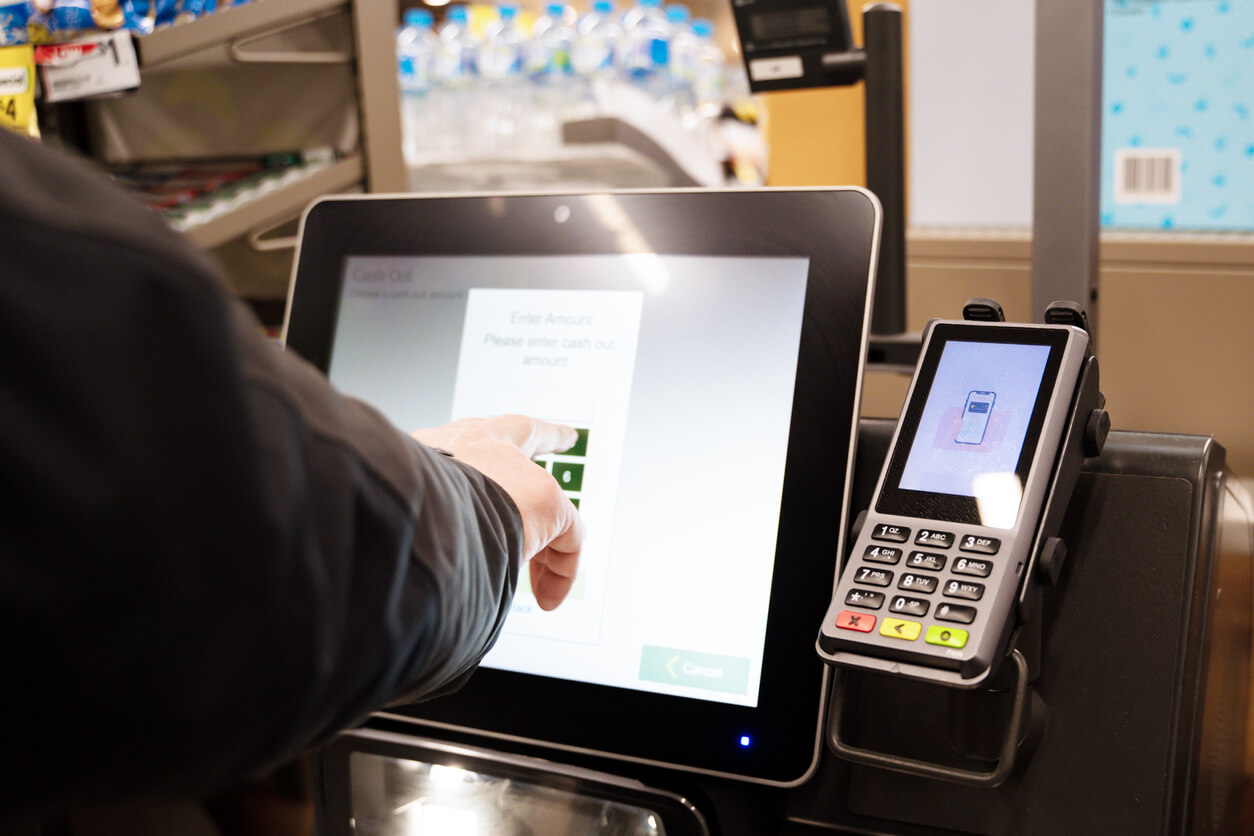 man in the self checkout line